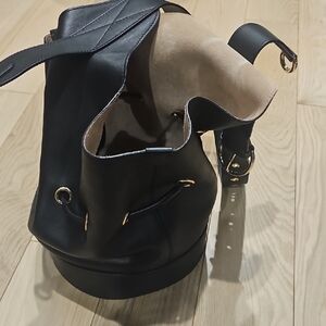 Black Leather Bucket Bag with Gold Accents